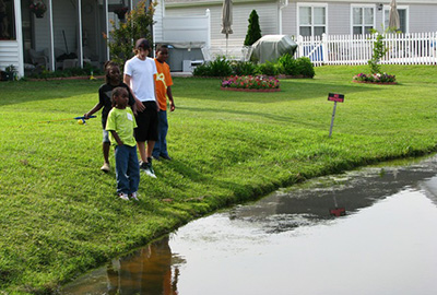 Youth fishing in stormwater pond