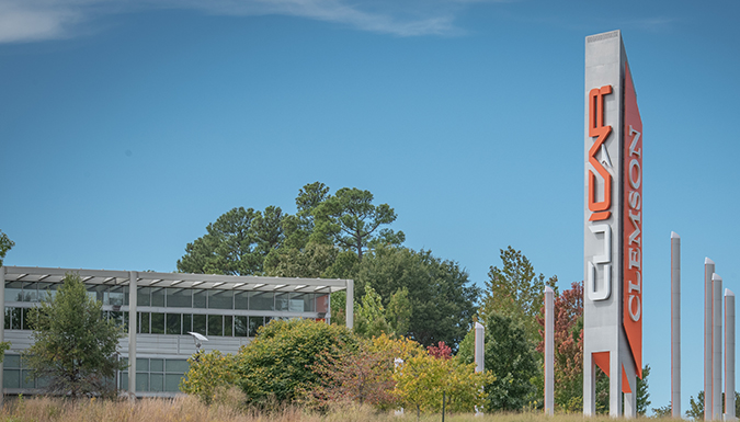 The Clemson University International Center for Automotive Research campus building and sign which reads CU-ICAR in Greenville, SC.