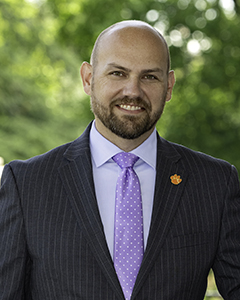 Headshot of Jaron M. Bruder.