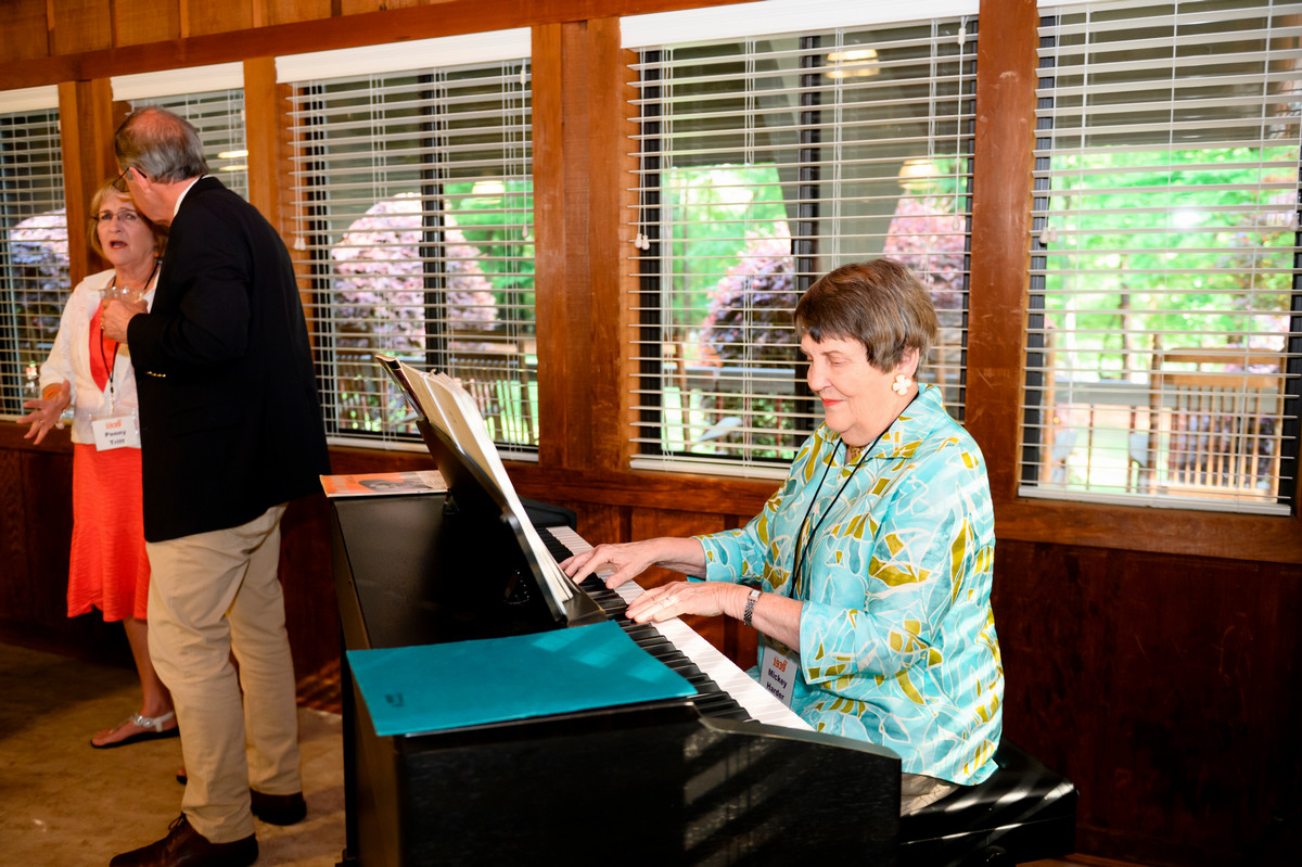 Mrs. Harder plays the organ at a Class of 39 meeting