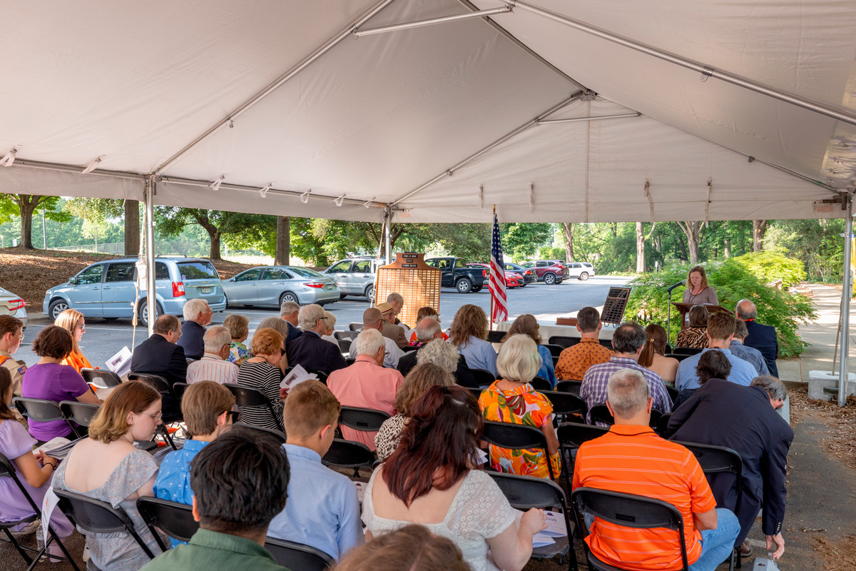 attendants under a tent at the South Carolina Botanical Garden