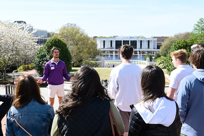 a group of high school students go on a tour of campus