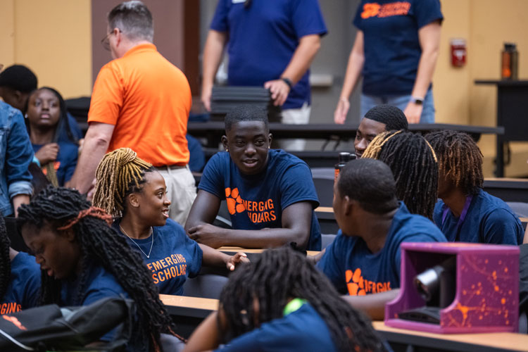 students in the emerging scholars program socialize during a session