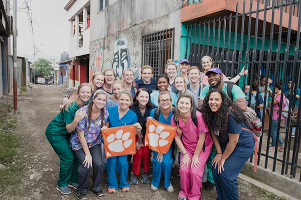 science students pose with tiger rags in Costa Rica