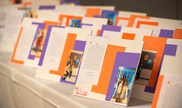 Letters arranged on a table to student teachers from their students with a photo attached. 