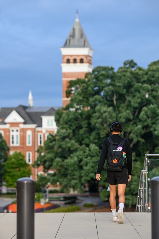 Student Walking Toward Tilman