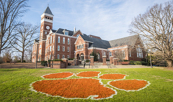 The freshly-painted Clemson University Tiger paw adorns Bowman Field on a beautiful fall morning
