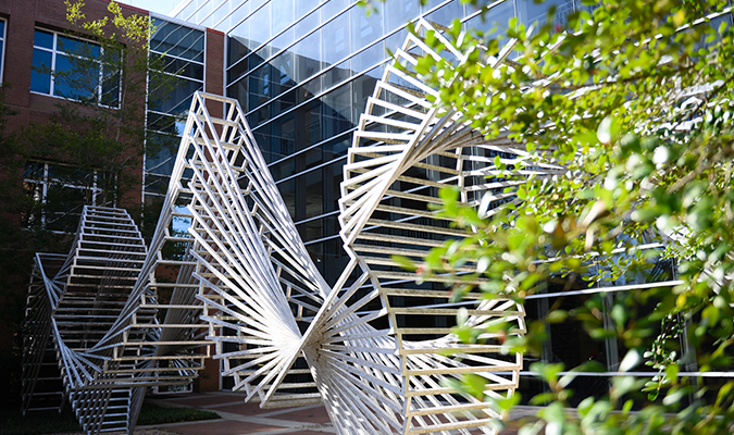 Sunlight reflecting off of a metal sculpture