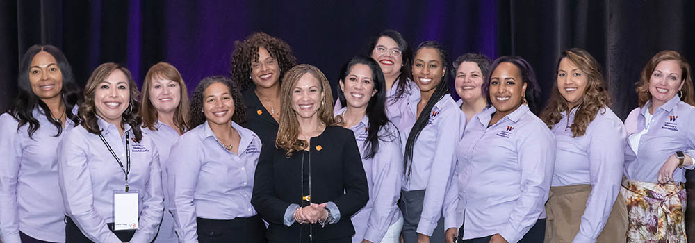 Attendees of the Women's Roundtable pose for a photo