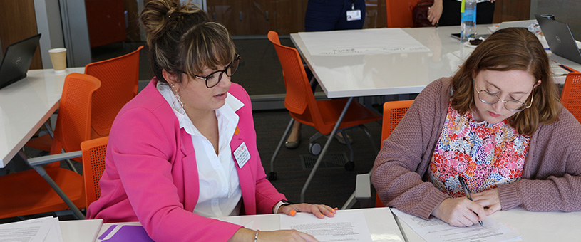 Faculty members working together