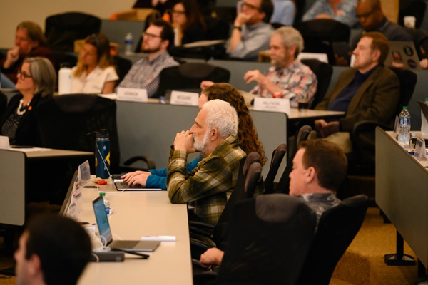 Faculty senate in a meeting.