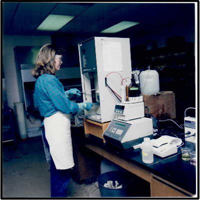 Donna Woodruff with Kjeldahl distillation and autotitration instrument 
