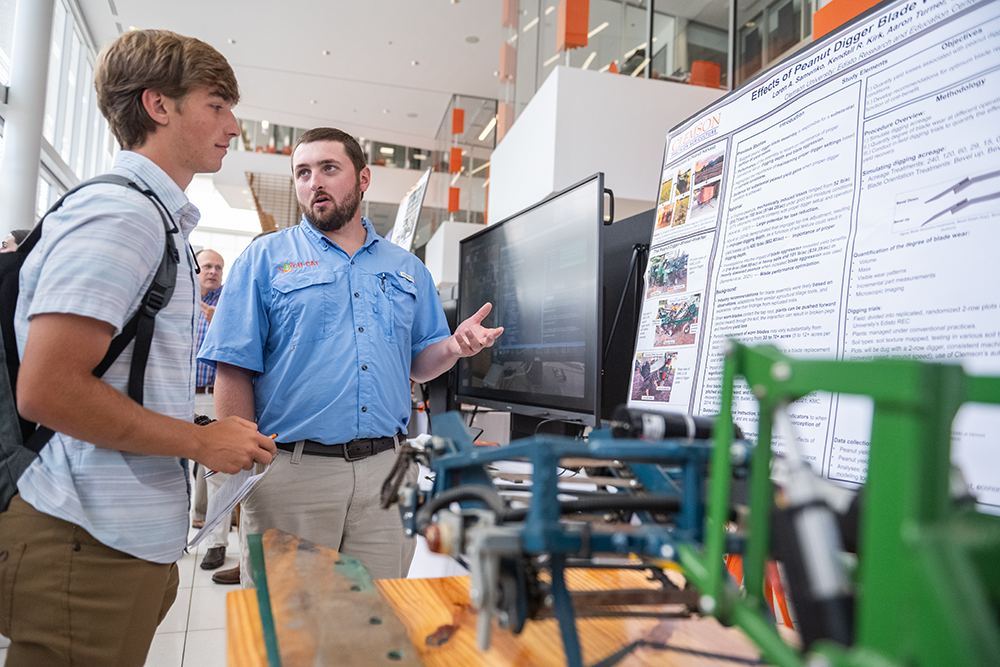 a student and presenter at a tech spotlight event