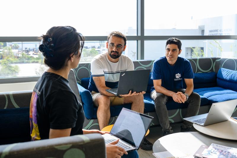3 people at zucker family graduate education center 