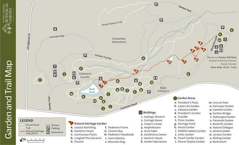 map of the south carolina botanical garden identifying paved roads, walking trails, visitor's center, points of interest, restrooms, garden habitats and parking areas