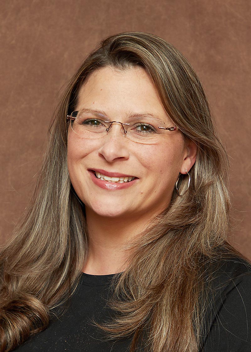Headshot of woman, Ashley Anthony.