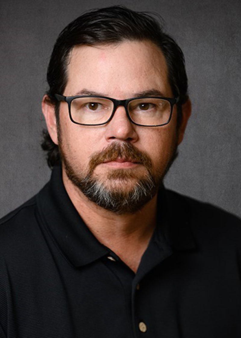 Headshot of man, Brad Elliott.