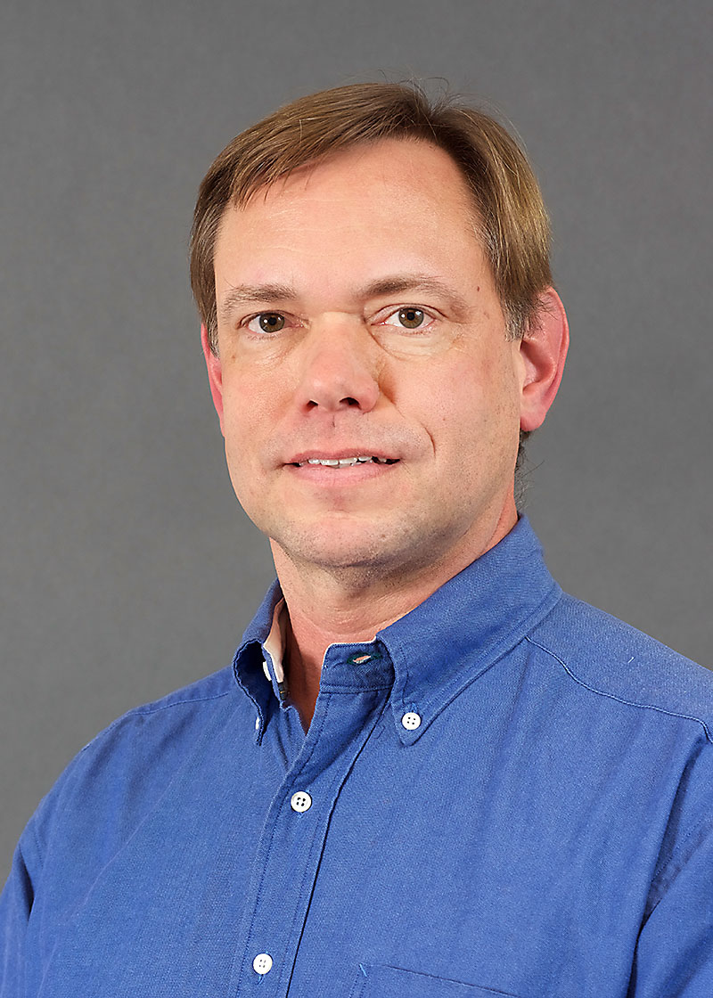 Headshot of Charles Allen.