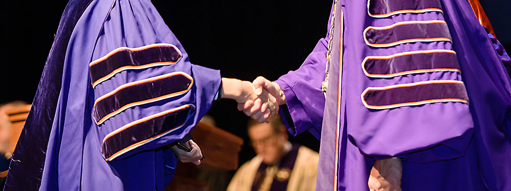 Decorative image of graduation hooding