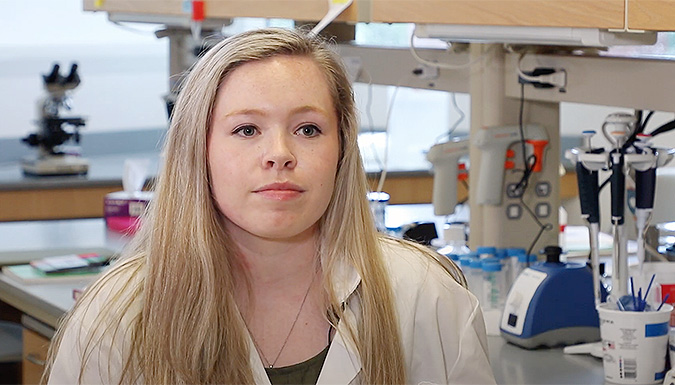 Student, Sadie English, speaking in a lab, directly to the camera.