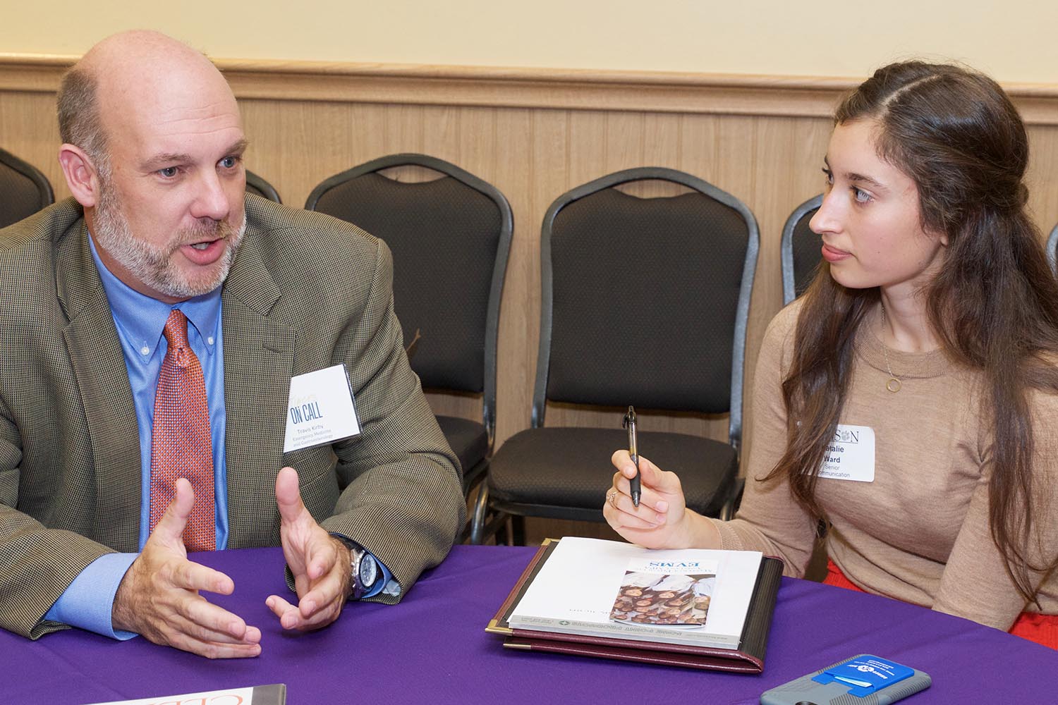 Students with health professionals.