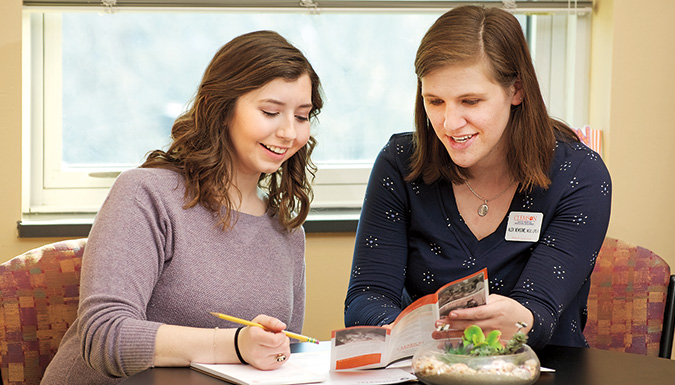 Student talking to counselor