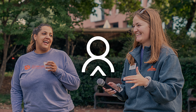 Clemson University staff interacting with a student, Clemson University