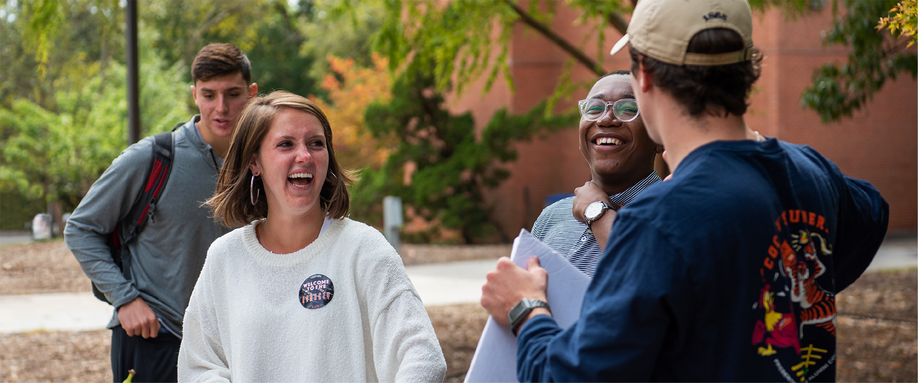 Clemson Student in campus interacting with each other.