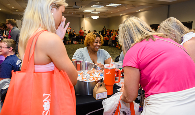 Staff from Clemson Lofts advertise to students and families at Ready, Set, Roar!