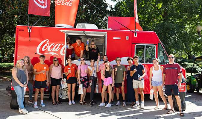 Student enjoys a Coca-Cola float on campus