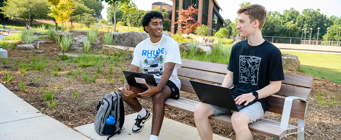 A student in conversation with Kathy Cauthen, Assistant Director, OAS