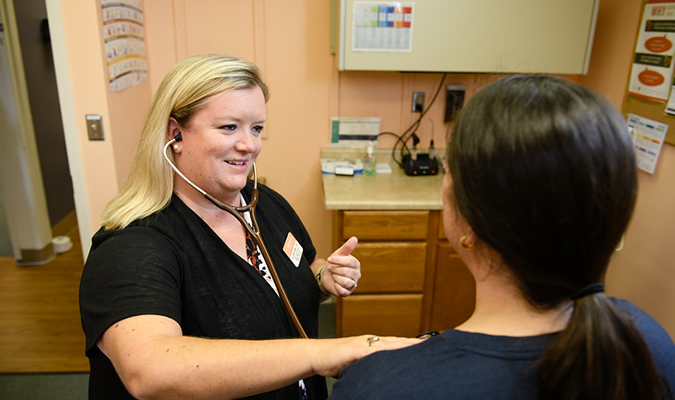 Student getting check-up at Redfern