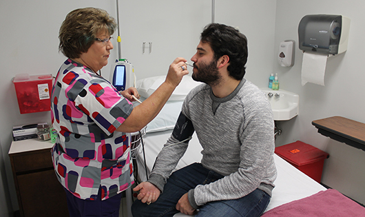 Student checking in at Redfern Health Center