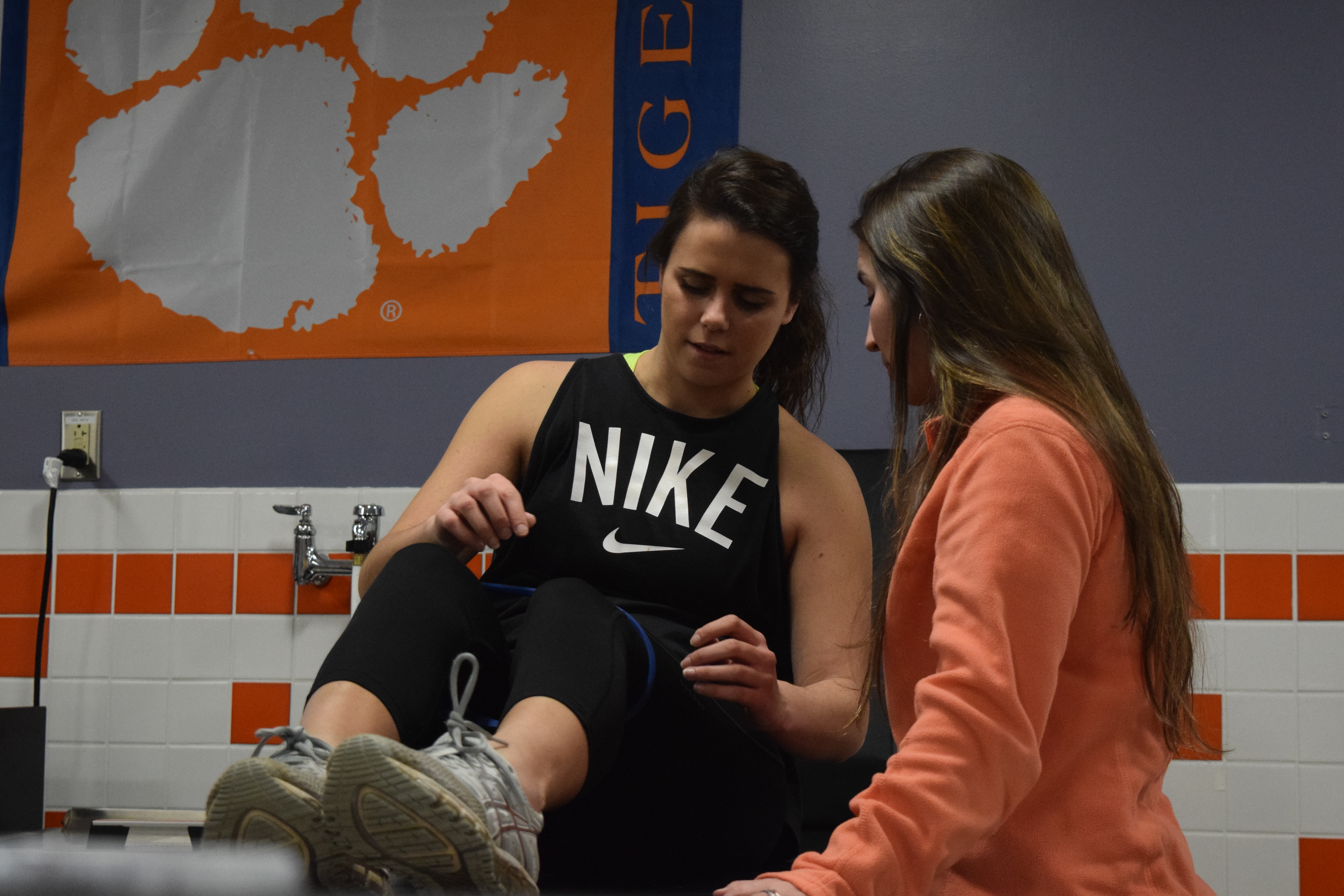 athletic training assisting patient