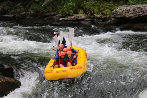 Students whitewater rafting