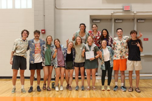 staff members in Hawaiian print shirts