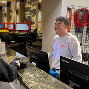 welcome center assistant working at the desk