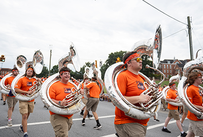 Clemson students band participating in the First Friday Parade