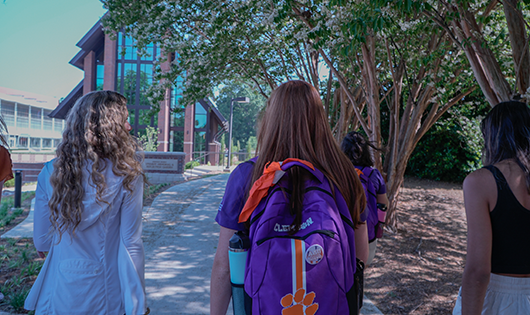 Students walking to Samuel J. Cadden Chapel