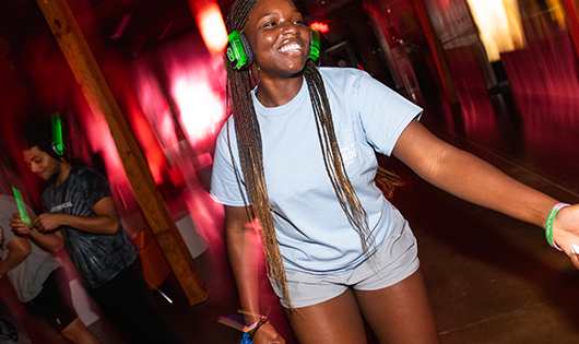 Clemson students dancing and enjoying at Glowga event, Clemson University