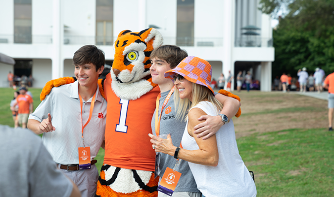 Students at Family Tailgate with Tiger Cub