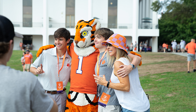 Students at Family Tailgate with Tiger Cub
