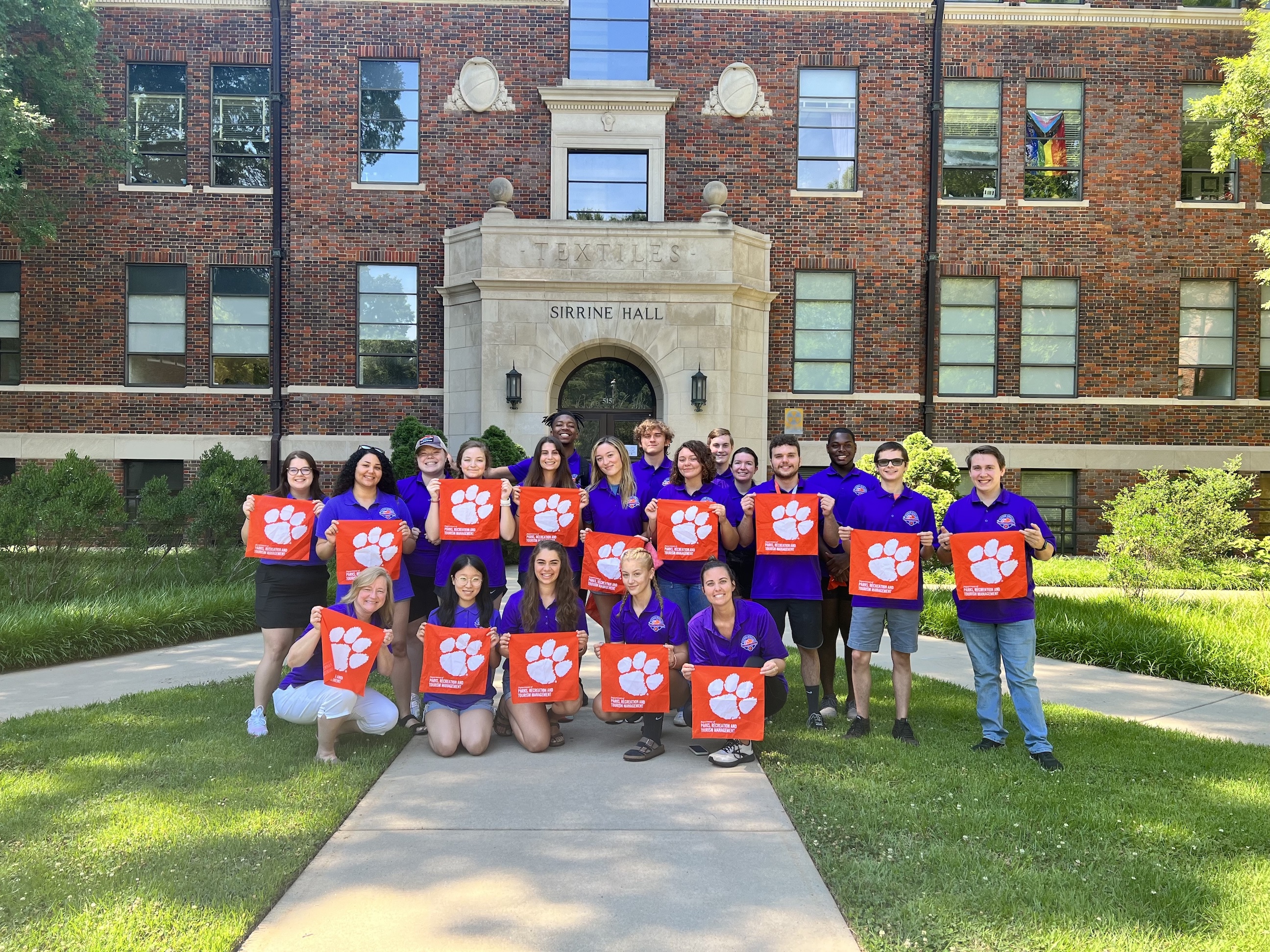 Summer Scholars counselors pose outside Sirrine Hall.