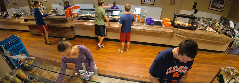 Students selecting food in one of Clemson's dining locations