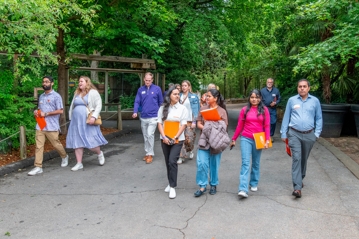 members of Tigers United tour Zoo Atlanta