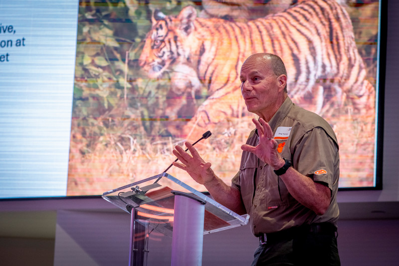 Greg Yarrow speaking at an event for local alumni at Zoo Atlanta's Savanna Hall