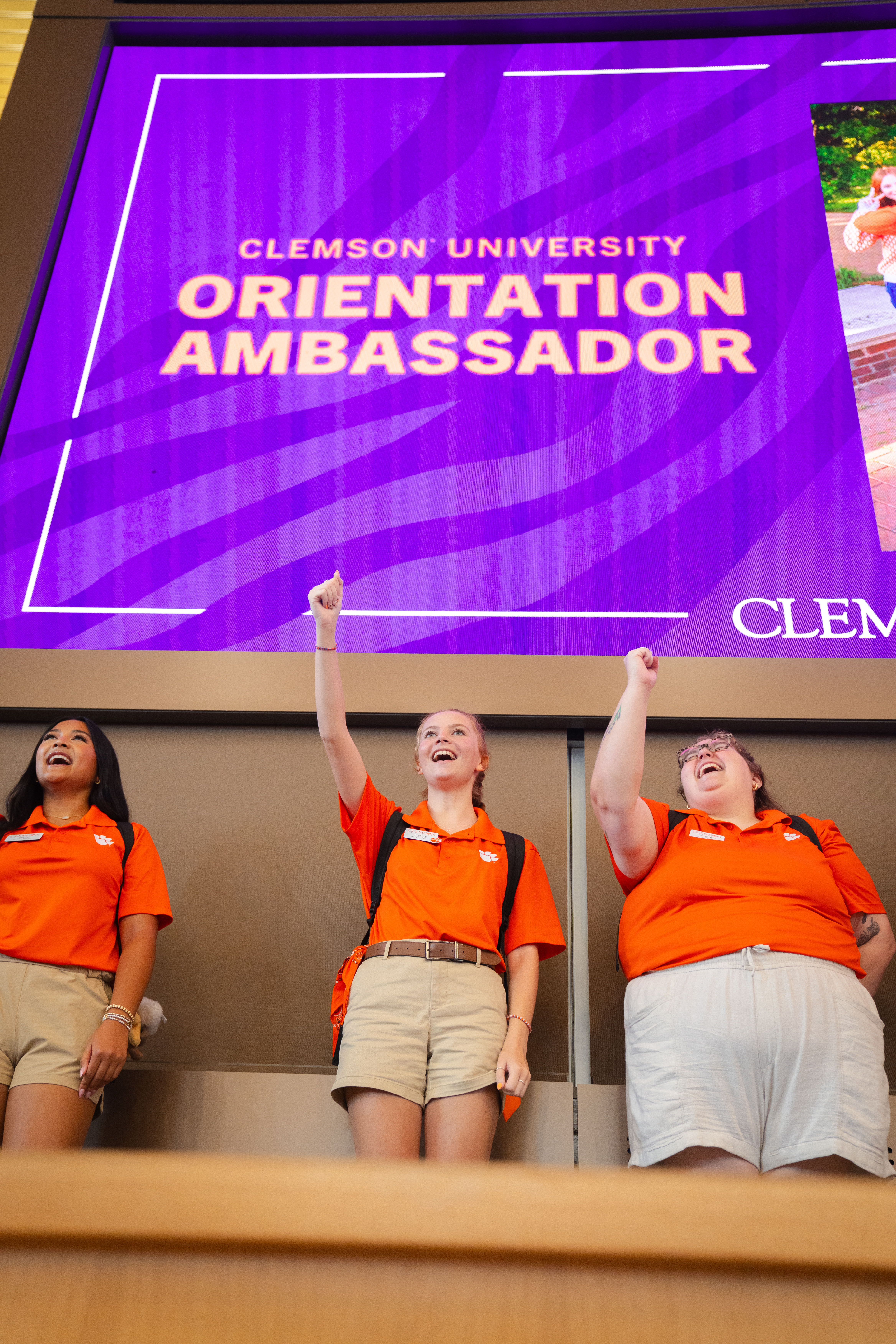 two female orientation ambassador chanting