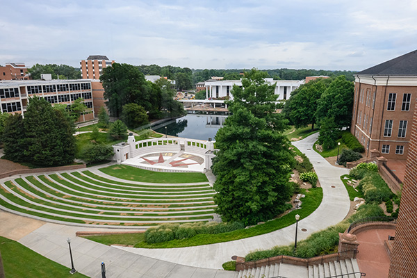 View of Martin Hall, amphitheater, library pond and library from the rooftop of Bracket Hall