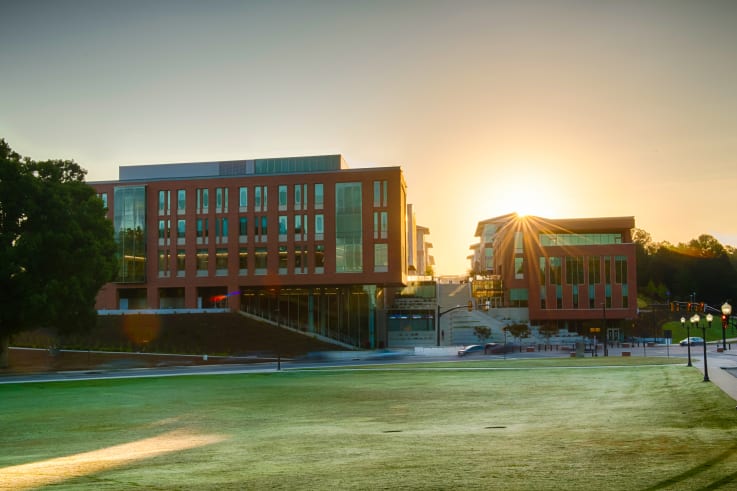 The Wilbur O. and Ann Powers College of Business at sunrise.