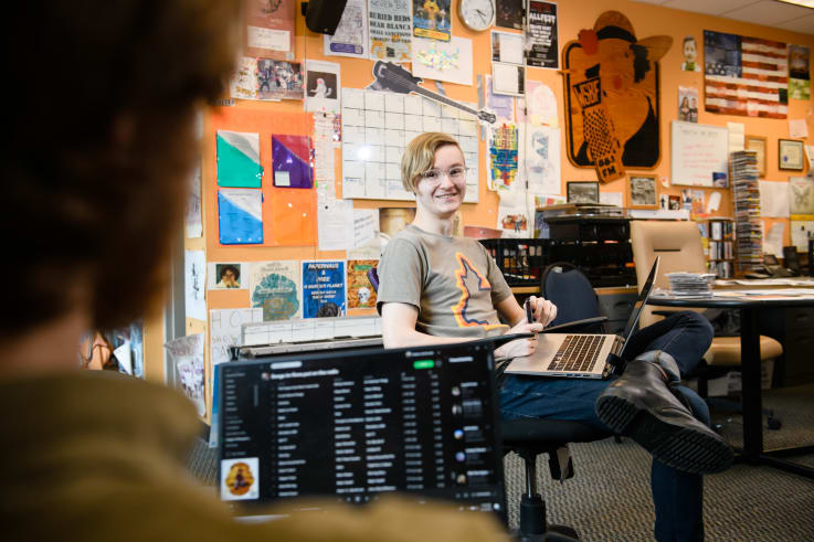 A student in the WSBF radio station in the Hendrix Center.